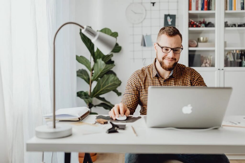 Business owner working on a laptop to grow their entrepreneurship