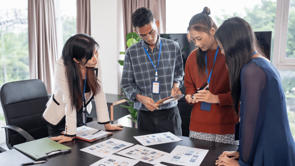 Team of Marketers Adjust Their Content Strategy for Answer Engine Optimization.